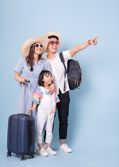 Image of young Asian family travel concept background