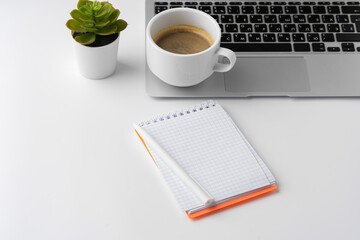 Poster - Office desk with laptop, blank notebook and coffee cup