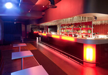 Nightclub Interior, Hospitality Venue And Colourful Lighting, Large Bar.  