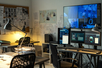 Aufkleber - Corner of small office of FBI agency with set of criminal profiles hanging on board and large screen security camera on wall