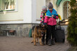 © Angelov - two little girls with the flag of ukraine, suitcase, dogs. Ukraine war migration. Collection of things in a suitcase. Flag of Ukraine, help. Krizin, military conflict.