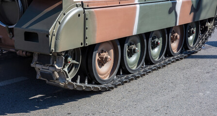 Military parade. Armored vehicle camouflage color, close up view. Army weapon for war and defense