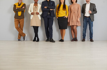 people in modern smart casual clothes. group of company employees in brown, yellow, dark blue and be