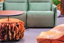 Round Wooden Coffee Table Decorated With Natural Mushrooms