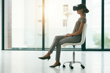 Aufkleber - Its so much easier to see the future, today. Shot of a young businesswoman wearing a VR headset in an office.
