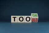Fototapeta Tęcza - Cubes form words Too young or too old. Concept of age discrimination - social problem