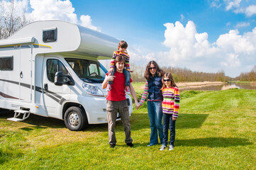 Wall Mural - Family vacation, RV travel with kids, happy parents with children have fun on holiday trip in motorhome, camper exterior
