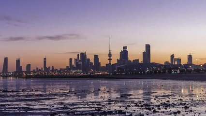 Poster - Seaside skyline of Kuwait city from night to day timelapse