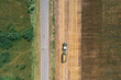 © Viachaslau - Tractor on a field. Aerial top view. Organic Products Concept. Agriculture industry.
