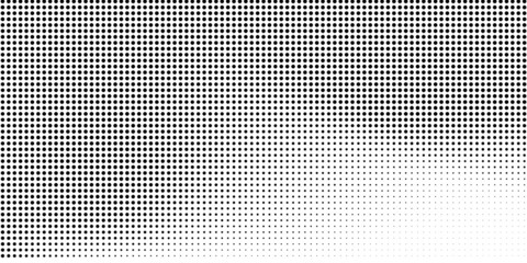 Wall Mural - Halftone dotted background. Black dots in modern style on a white background.