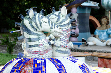 sculptures two zebras on the landscape alley in summer beautiful Kyiv