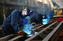 A Welder Works At A Factory	