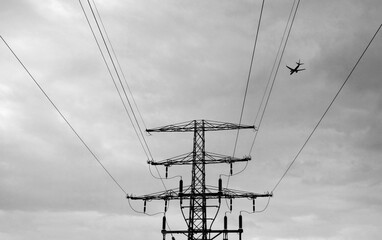 power lines with aeroplane