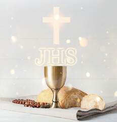 Wall Mural - Chalice of wine with bread and rosary beads on light background. Holy Communion concept