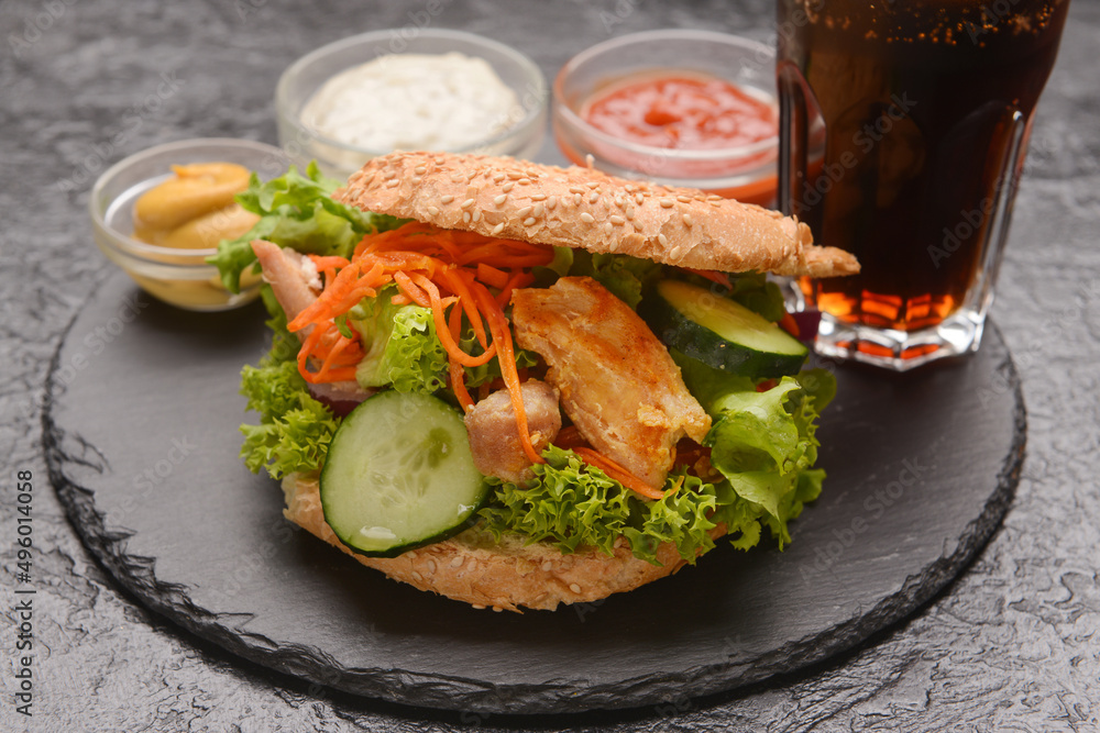 Fresh doner kebab in bun on dark background