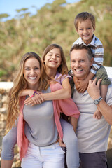 Canvas Print - Joyful family holiday. Shot of an affectionate family on holiday.