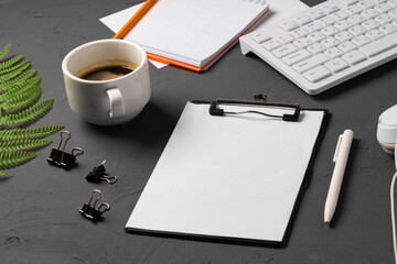 Poster - Clipboard mock up on home office workspace with coffee cup and stationery