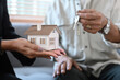 © Prathankarnpap - Senior owners making sale purchase property with real estate agent.