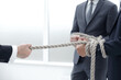 © ASDF - close up.businessman drags his business team by the rope