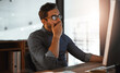 © Jadon B/peopleimages.com - My brain needs a break. Shot of a young businessman yawning while working late on a computer in an office.