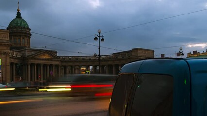 Poster - St Petersburg, Russia. Illuminated Cathedral of Our Lady of Kazan, Russian Orthodox Church in Saint Petersburg, Russia at night with car traffic trail lights at the forefront. Time-lapse, pan video