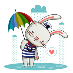 Wall Mural - cute bunny with umbrella enjoying the rain