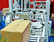 © xy - Box on packaging line in factory