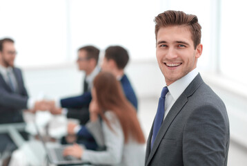 Wall Mural - portrait of businessman on blurred background