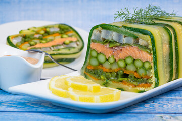 Recipe of marbled vegetables, salmon and langoustines, terrine salmon vegetables and langoustines