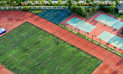 Wall Mural - Top view of football field and runway