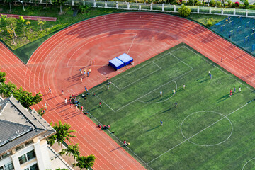 Wall Mural - Top view of football field and runway