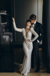 Beautiful and sexy bride and groom in a luxury hotel. Wedding day