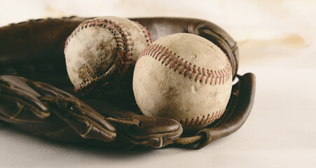 Sticker - Old baseball ball from sport game closeup in leather glove.