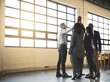 © Lyndon Stratford/peopleimages.com - We feel good about the work we do. Shot of a diverse team of happy businesspeople high fiving each other in the office.