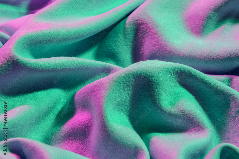 Texture of color cloth with folds, closeup