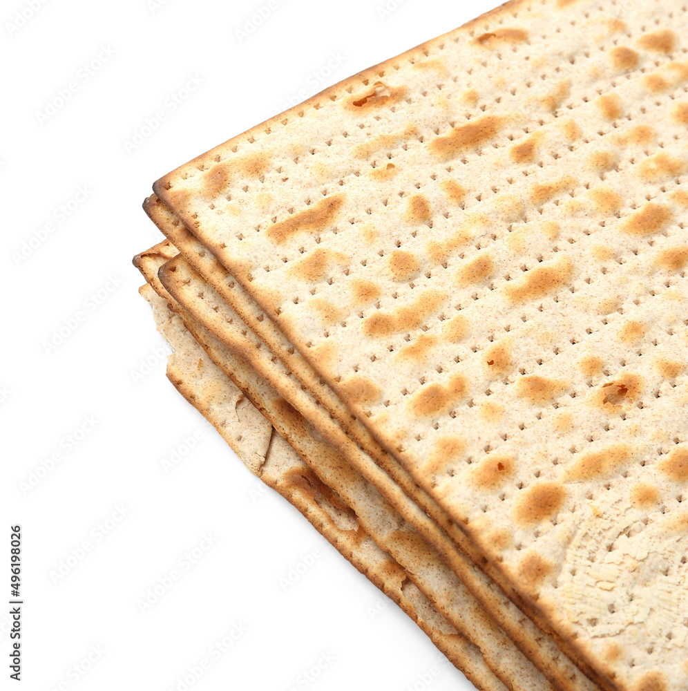 Jewish flatbread matza for Passover on white background, closeup