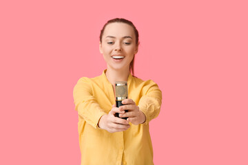 Sticker - Young woman with professional microphone on pink background, closeup