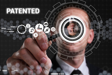 Business, technology, internet and network concept. Young businessman thinks over the steps for successful growth: Patented