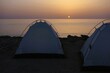 Coucher de soleil en camping en bord de mer au Golf d'Oman