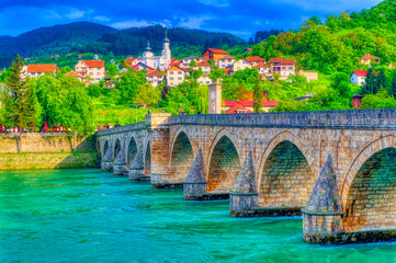 Wall Mural - Aerial view over famous Mehmed Pasha Sokolovic Bridge in Visegrad, Bosnia and Herzegovina.