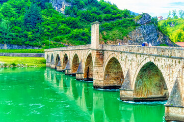 Wall Mural - Aerial view over famous Mehmed Pasha Sokolovic Bridge in Visegrad, Bosnia and Herzegovina.