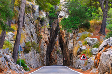 Straight Road Through Narrow Passage Between The Rocks, Majorca, Spain