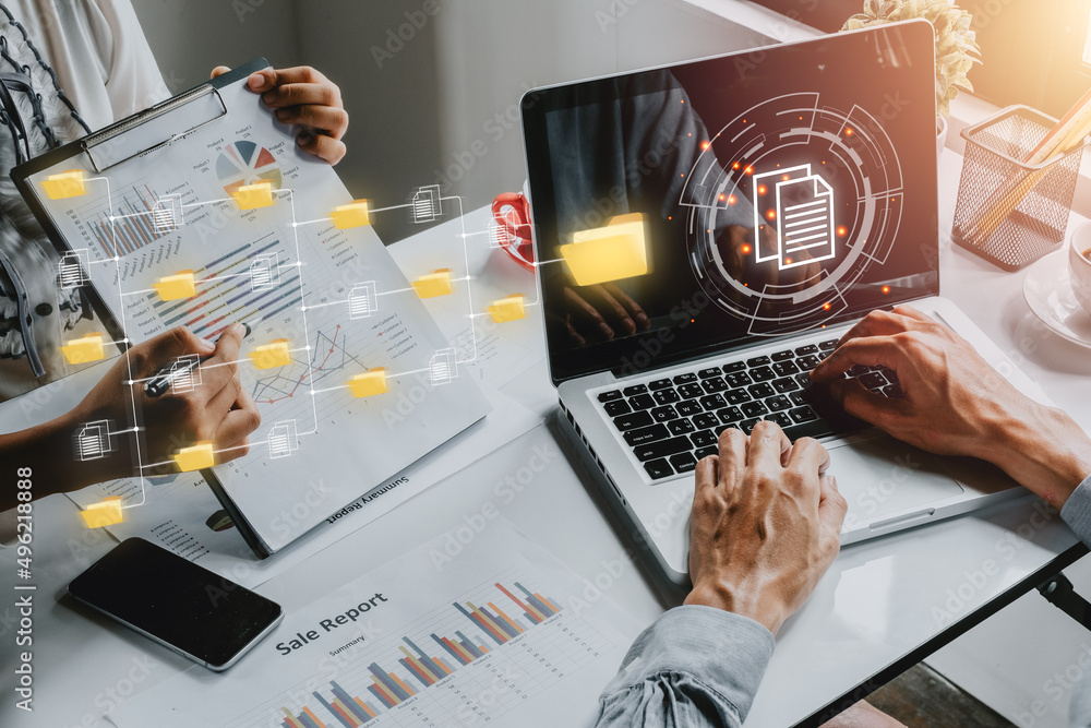 Document management system concept, Business team working on laptop ...