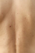 © Atlas - Concept of body care with back of young man