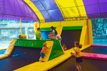 Wall Mural - The happy child have a nice day in the trampoline park