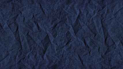 Wall Mural - Blue crumpled fabric. Dark wrinkled fabric. Background with copy space for design.