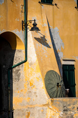 Wall Mural - old facade of a house in the small sea village of Variotti, in Liguria, Italy