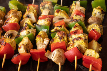 Wall Mural - chicken skewers with mushrooms and vegetables