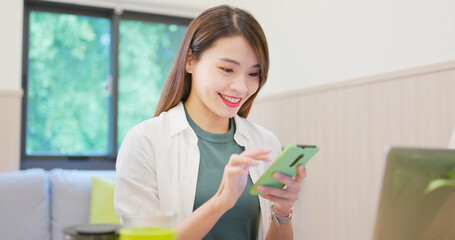 Canvas Print - woman using mobile at home