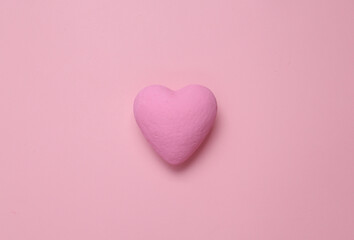 Pink heart on a pink background. Minimal love still life